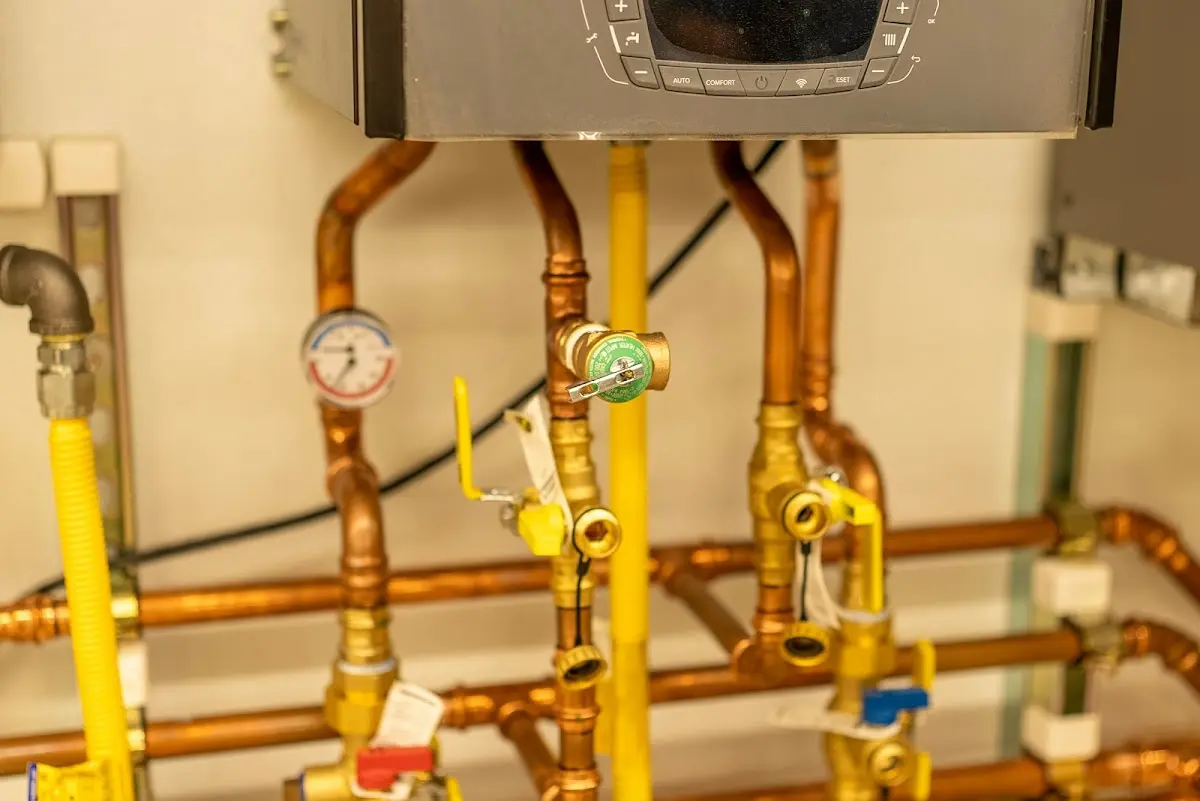 Licensed technician providing Backflow Prevention for a homeowner in Hinesburg